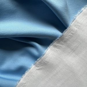 Трикотаж двусторонній блакитно-молочний